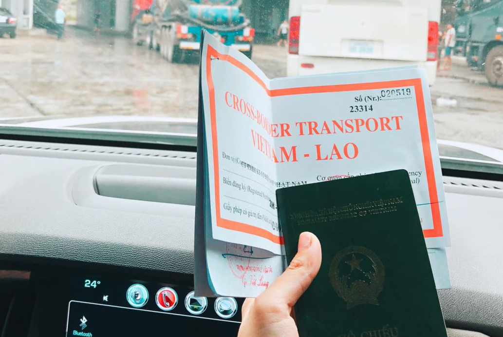 Documents are issued to bring cars to Laos.  Photo: Minh Anh