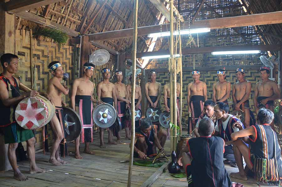The new communal house worshiping ritual takes place inside the communal house. Photo: PL